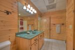 Lower level bathroom with a tub shower combo 